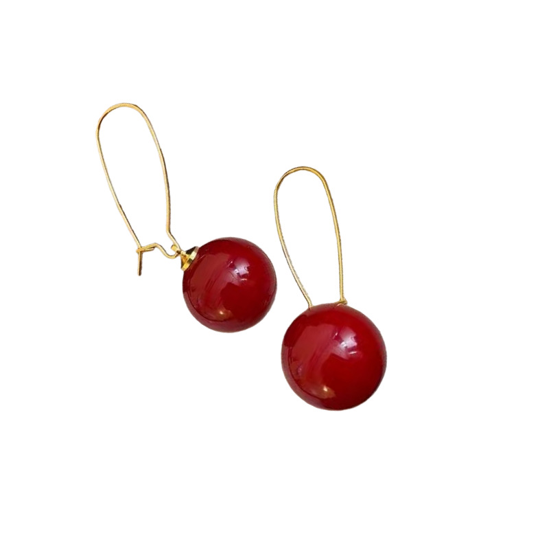 2025 nuevos pendientes de perlas nicho lujoso ligero celebración de perlas rojas otoño invierno sensación de alta calidad perlas auriculares temperamento ganchos de orejas