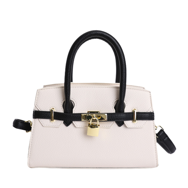 Coreano simple bolso de mano mujer 2026 primavera nueva bolsa de viaje diario texturizada bolso de mochila