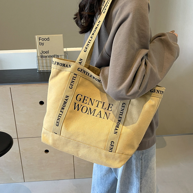 Moda simple lienzo impreso carta bolsa de hombro 2024 gran capacidad de trabajo de alta calidad bolso de mano
