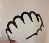 Чёрный (волнистый)