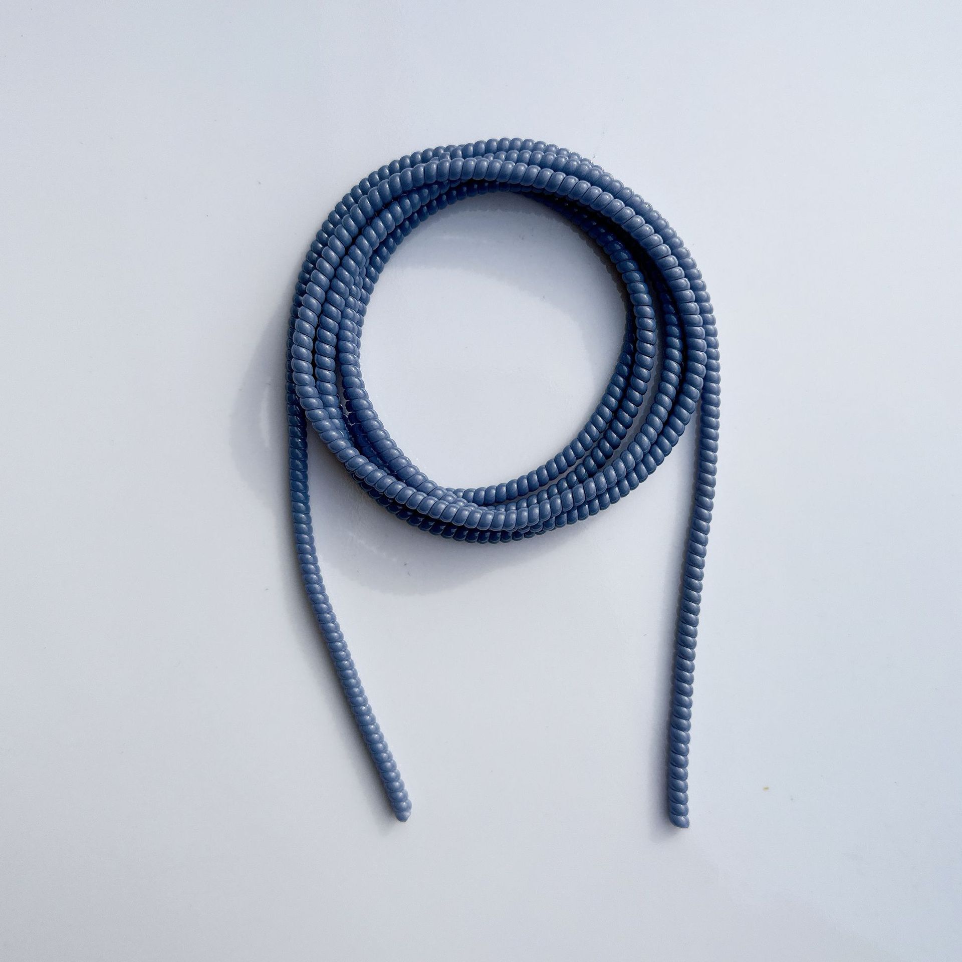 1.4 Cuerdas de protección de color sólido de 1,6 metros de cable de datos para línea de teléfono celular anti-ruptura cargador de cable de bobinado