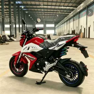 Qırmızı-ağ iki təkərli, yanacaqla işləyən, off-road motosiklet