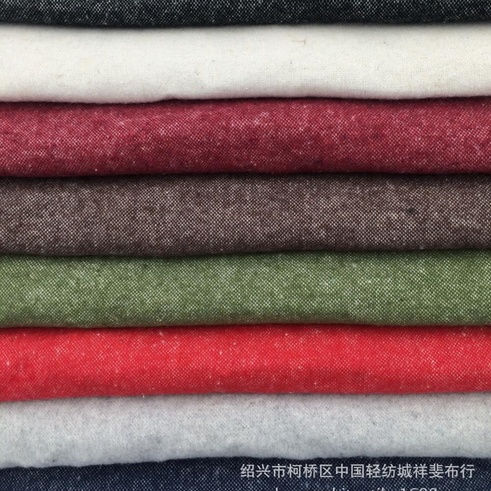 供应8色百搭磨毛双经双纬素色青年布适中厚服装淘现货面料休闲