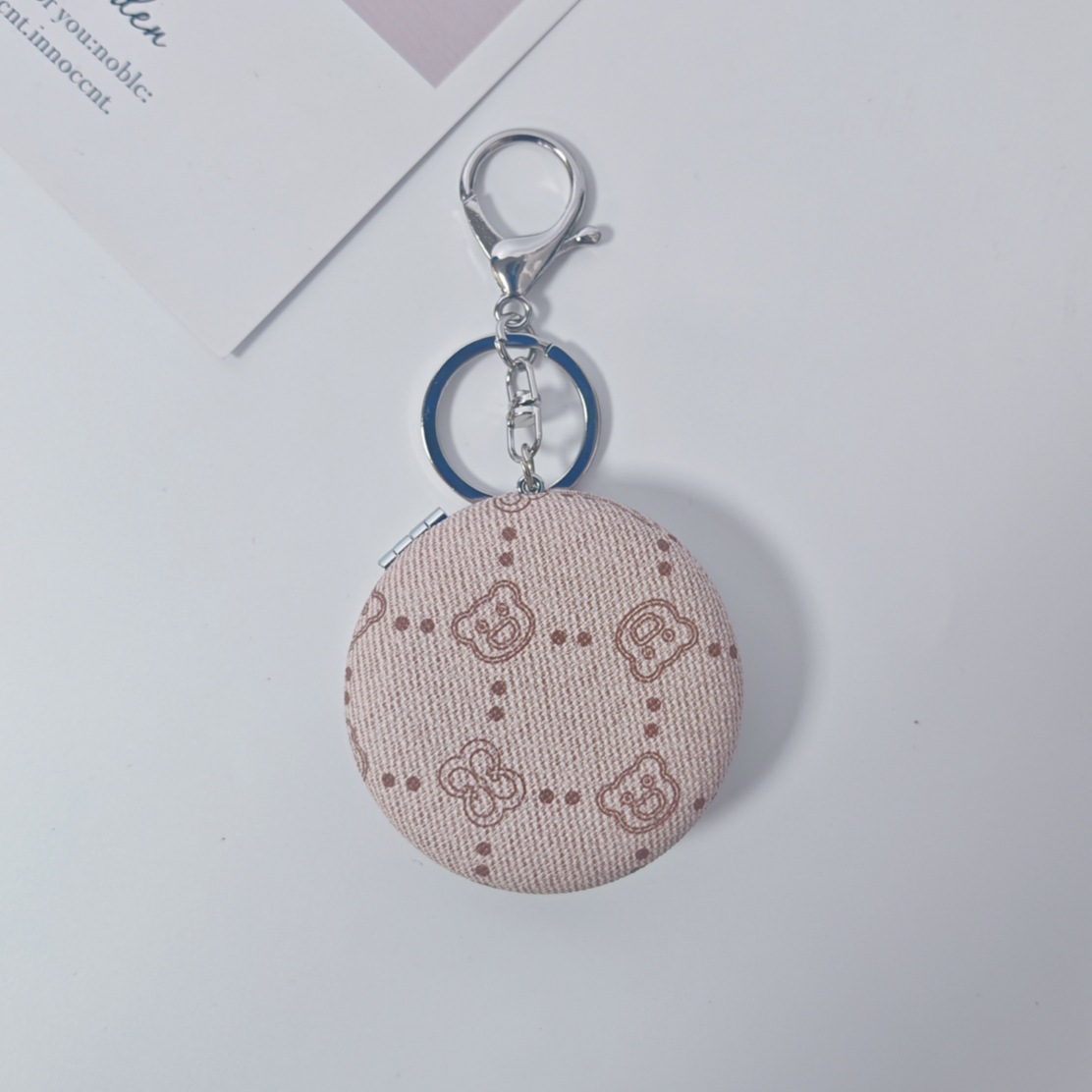 Bolsa de espejo popular en línea colgante de lujo ligero llavero portátil espejo de maquillaje transfronterizo colgante de bolsas de espejo doble cara