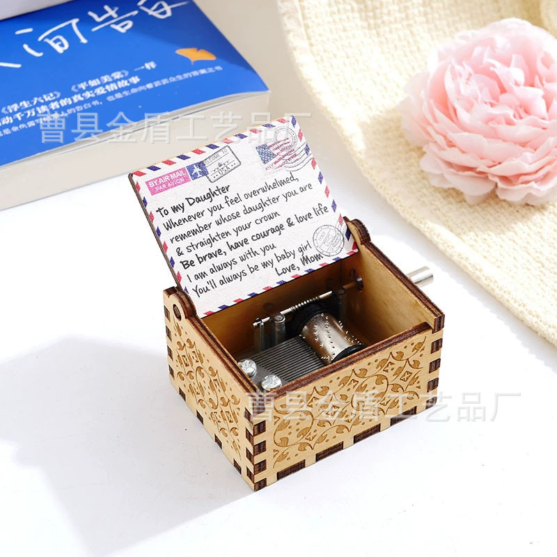 木製の手で音楽箱のアイデアを揺らします。|undefined