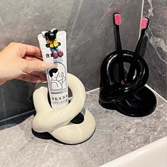 クリエイティブな歯ブラシホルダー、ハイエンドの手動歯ブラシベース、化粧ブラシ収納ラック、トイレの洗面台