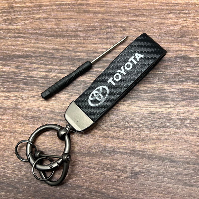 ハイエンドの炭素繊維の革のキーホルダーの車のロゴの広告のキーホルダーのビジネスの自動車のキーホルダーのペンダントの卸売り|undefined