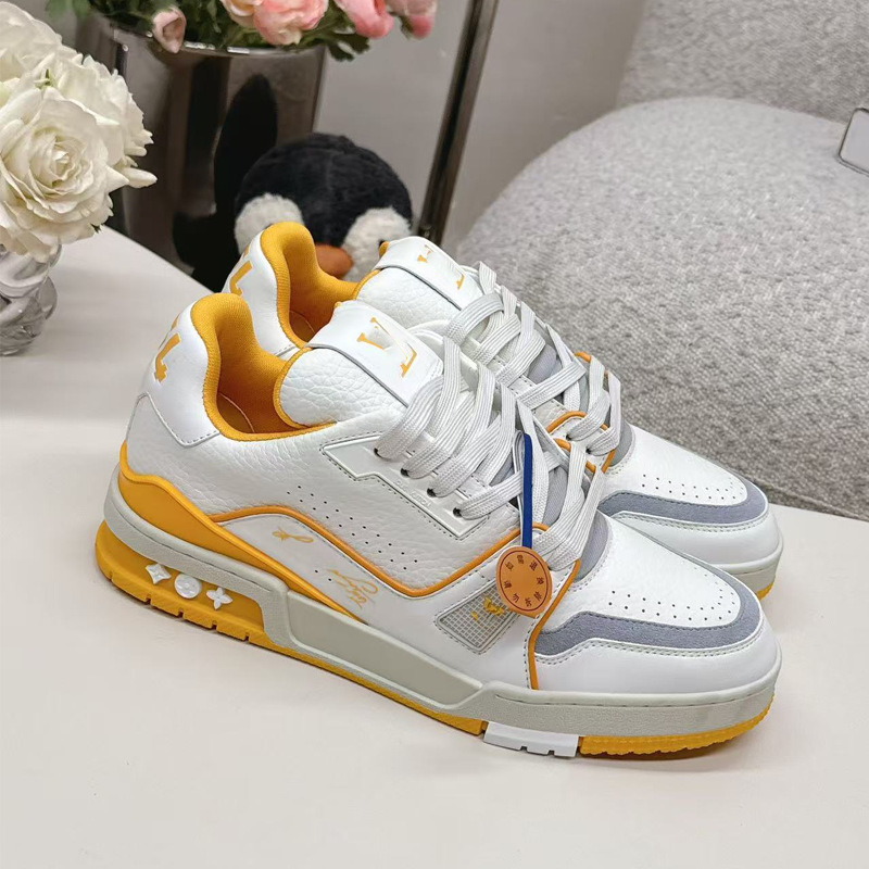 Zapatos de moda europeos Guangzhou de alta versión驴 entrenador zapatos deportivos ociosos de cuero universal para hombres y mujeres