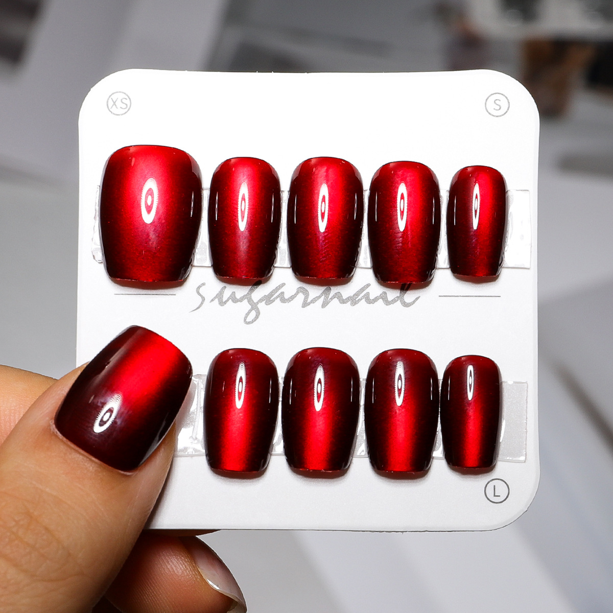 Año Nuevo usar uñas de alta calidad 10 piezas de tamaño rojo oscuro ojos de gato uñas falsas puras para vender manicuras