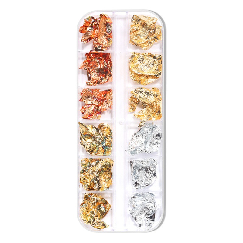 Nuevo estilo japonés Nail Art oro y plata papel de aluminio 12 caja de tira de rejilla arte de uñas de cuatro colores de papel de aluminio joyería fragmentos de hoja de oro