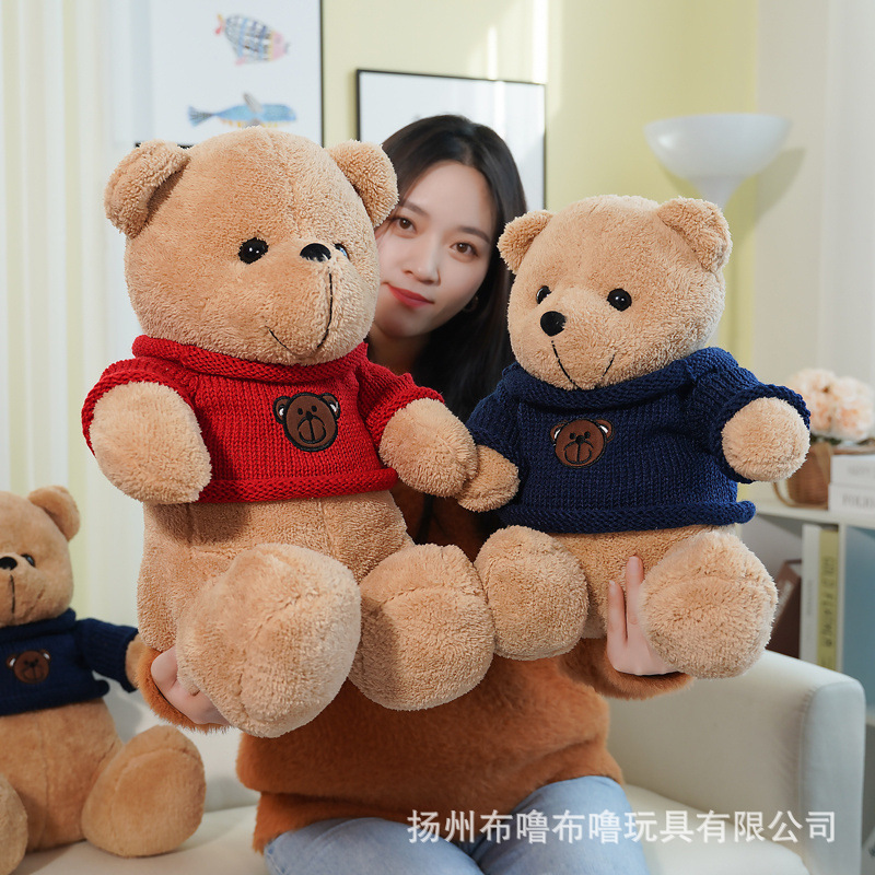 Cute dressing and sitting teddy bear dol...