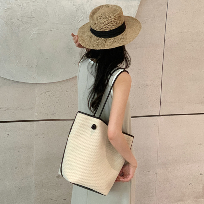 Vacation style leisure large capacity single shoulder tote 2024 new simple commuting big women's bucket baozi mother bag_voghion.com