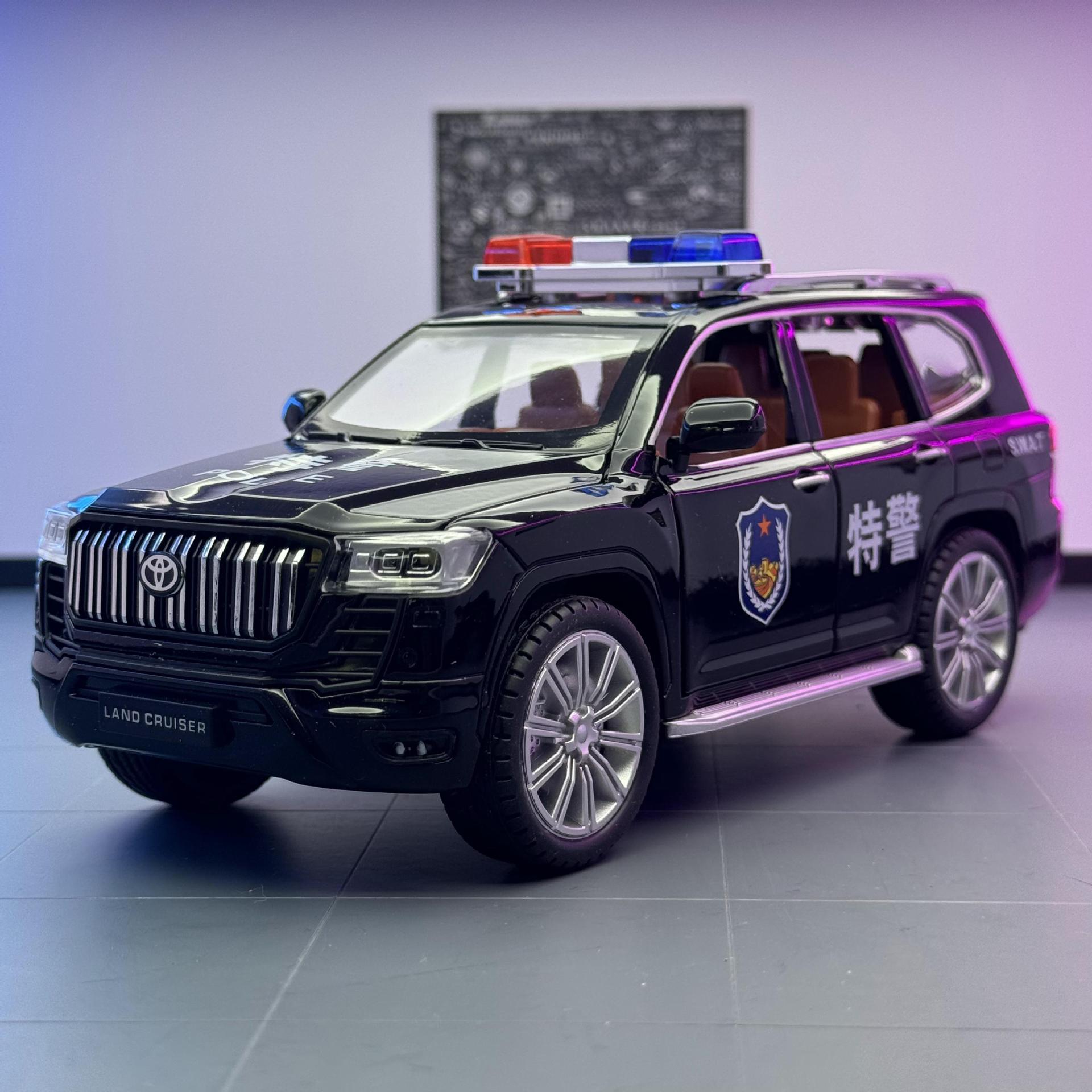 Weili aleación coche modelo 1:24 Toyota Prado autoritario coche de policía Tire hacia atrás el sonido y la luz del coche de juguete modelo de música Decoración