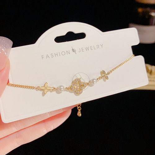 Internet celebrity style, fashionable and elegant, delicate micro-inlaid hollowed-out four-leaf clover bracelet for women, sweet and luxurious all-match bracelet