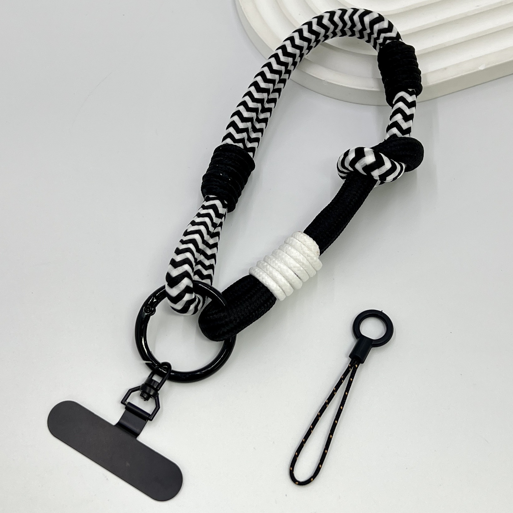 Gran anillo grueso ajustable cuerdas de muñeca empalme de caso de teléfono móvil japonés y coreano corto hardware rotativo hoja de metal resistente a caídas