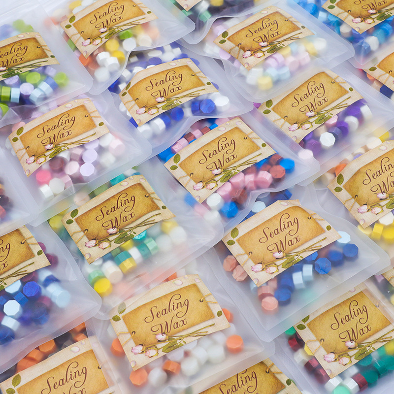 Ocho-lado fuego pintura cera grano mezclado color 35g bolsa de embalaje fuego pintura cera sello al por mayor sobre DIY mano cuenta de sellado Uso de cera