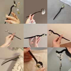 かわいい桃の木のかんざしのチャイナドレスは水蜜の桃のかんざしの女性の後頭部を飾って団子の頭の国風の頭のアクセサリを出します。