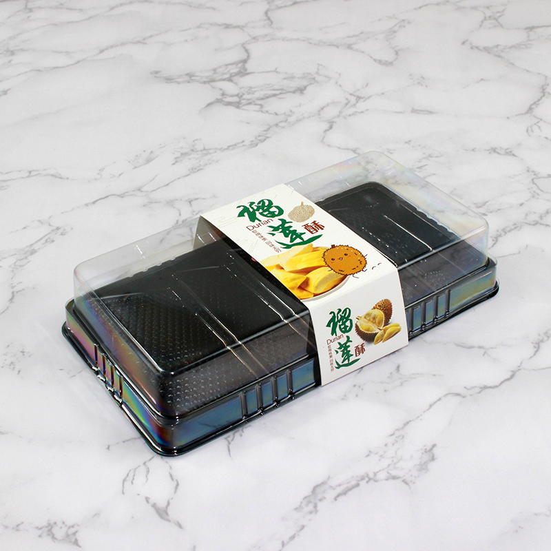 Caja de embalaje de 2 / 5 cápsulas de tortilla de durian transparente rectangular trapezoidal succionada horneado West Point desechable 609 caja de embalaje