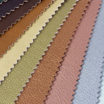 厂家热压LOGO变色革 卡斯扣压变鞋材革商标革面料