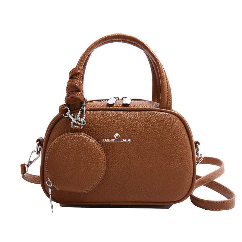 Bolso de moda coreano 2025 primavera y verano nuevo bolso femenino bolso de hombro con patrón de lichi simple bolso de mensajero de letras casuales