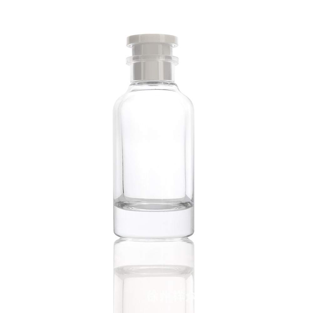 Venta al por mayor al por mayor al por mayor de perfumes transparentes cilíndricos de alta gama en botellas de aceite esencial en aerosol, un conjunto completo de tapas y muestras pequeñas presionan botellas vacías