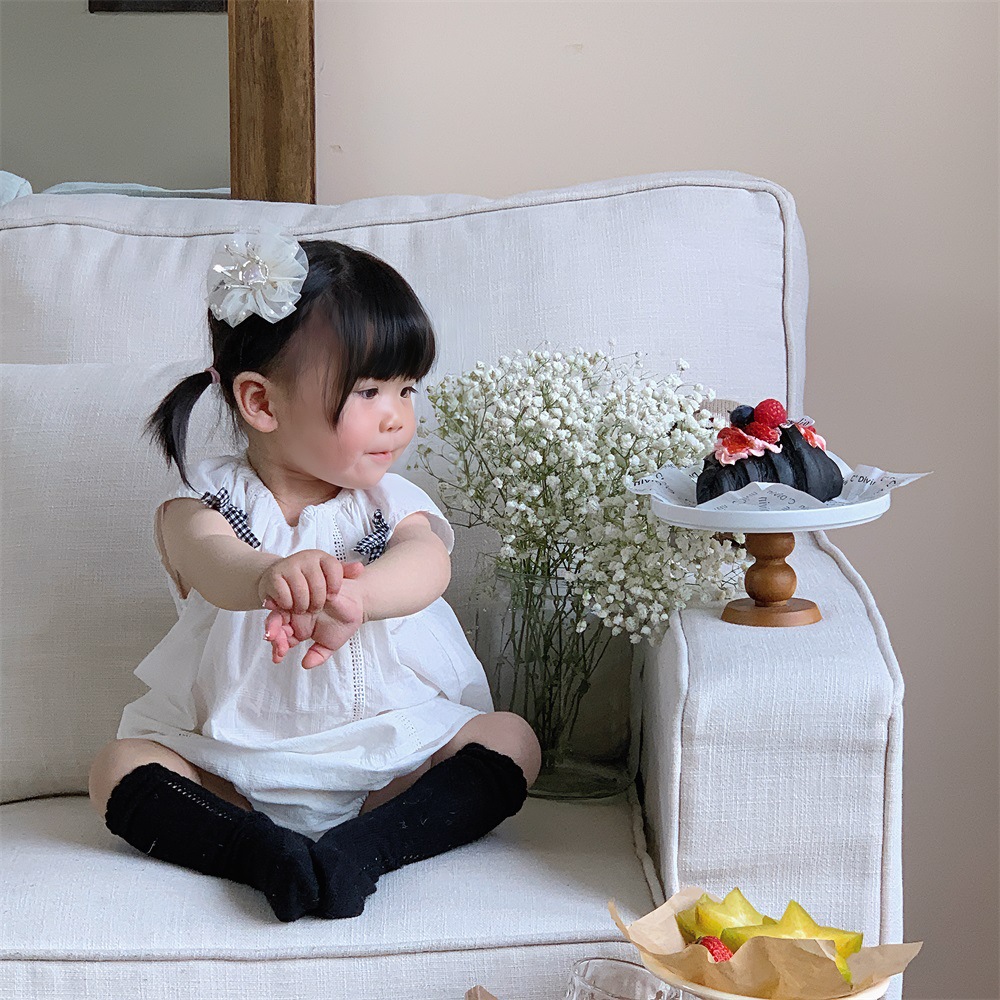 Ropa de bebé 2024 estilo fino de verano a algodón puro de 1 a 3 años de edad, traje sin mangas de color sólido, ropa de salida informal