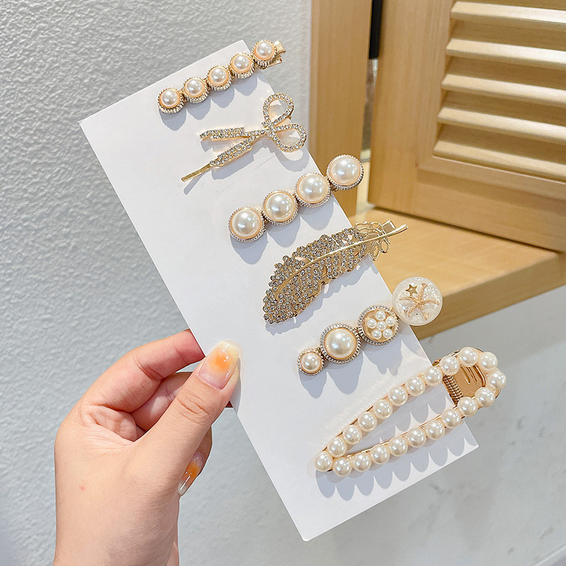 Clip de flequillo lateral rojo de la red femenina 2025 nueva horquilla simple clip de una línea horquilla clip de cabello roto tocado clip de pico de pato