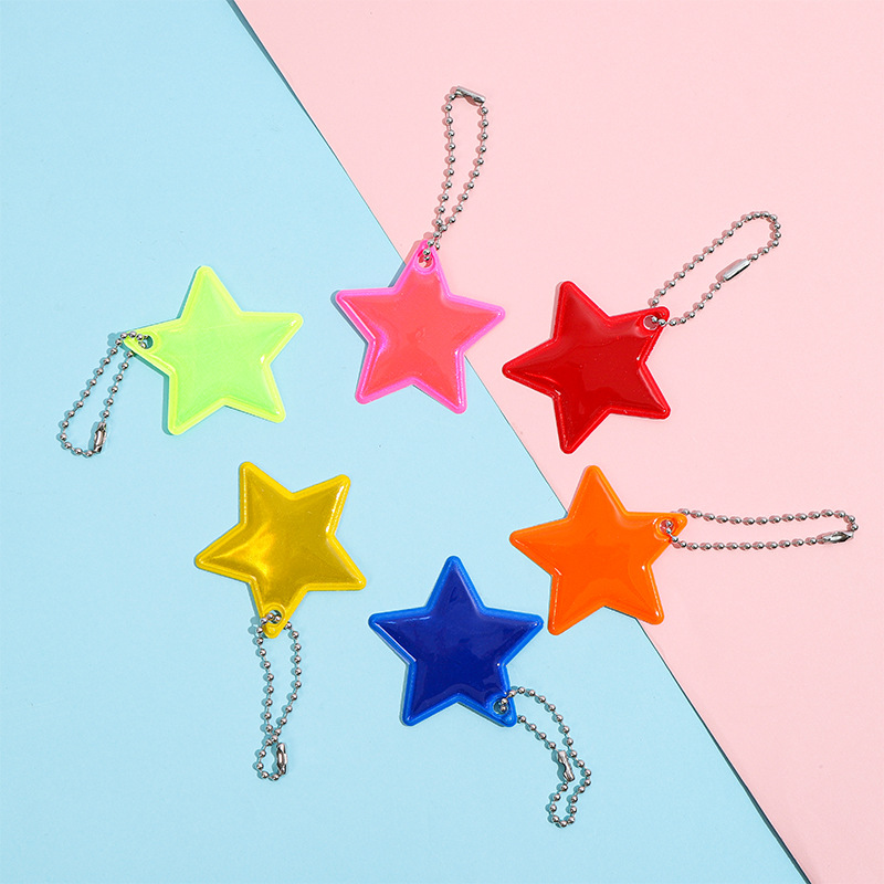 Llavero Colgante Reflectante de Estrella de PVC para Mochila Escolar y Ciclismo