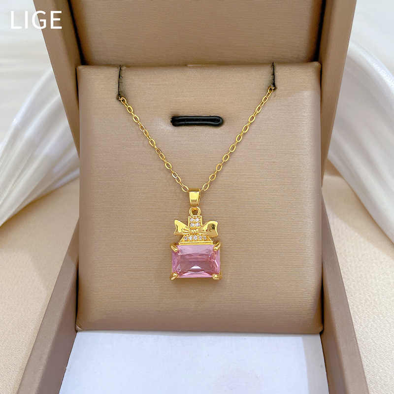 Set collana e orecchini a farfalla con boccetta di profumo_voghion.com