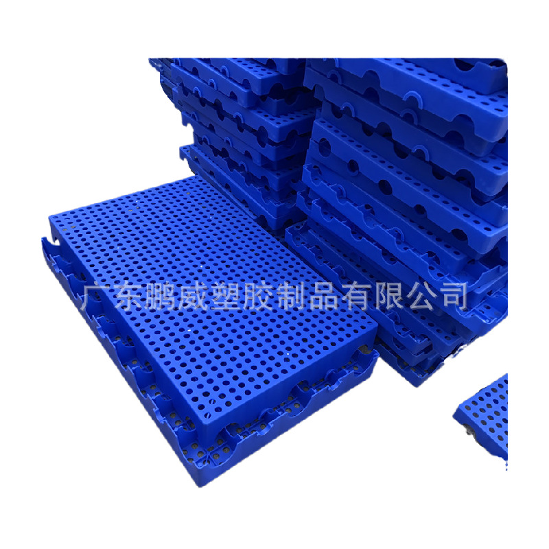 供应仓库防潮塑料垫板100*60 隔水板垫仓板的组合塑胶托盘 脚踏板
