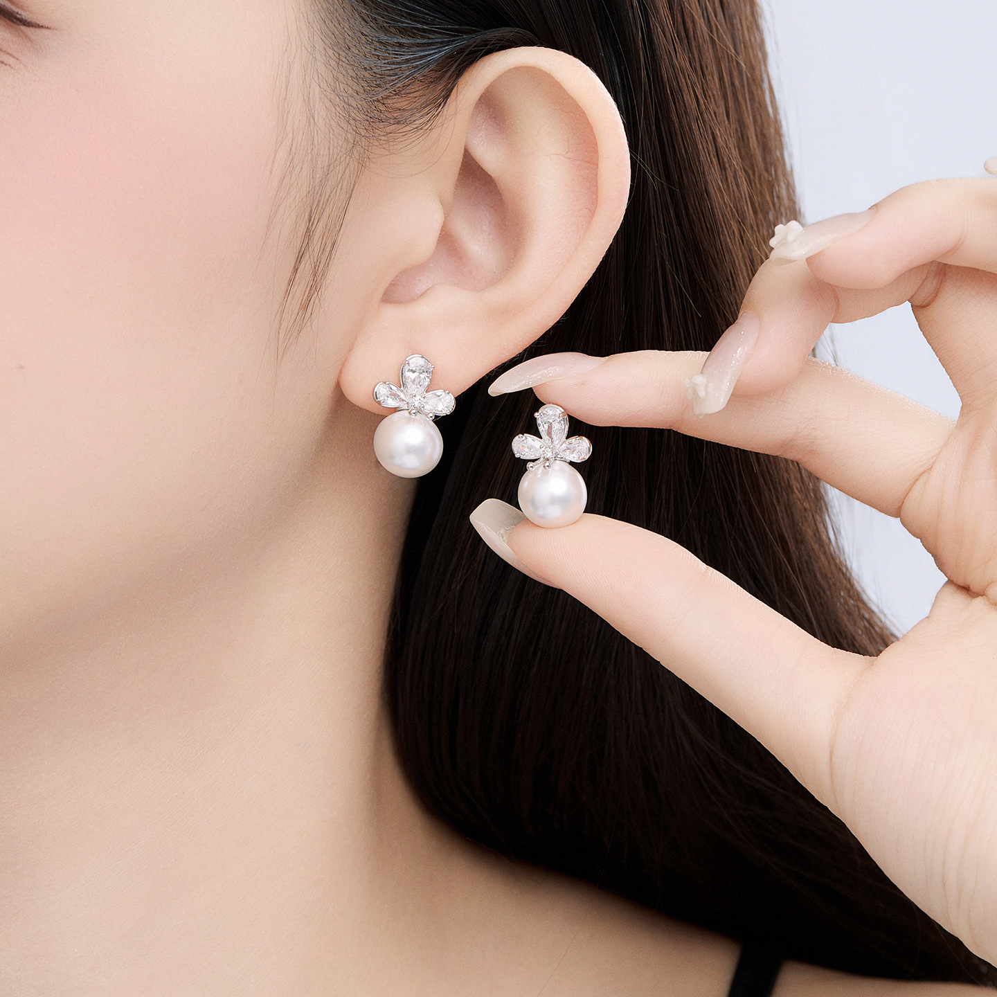 Xuping moda dulce estilo japonés y coreano imitación de perlas orejas de aleación de cobre chapado blanco ligero lujoso temperamento elegante pendientes al por mayor