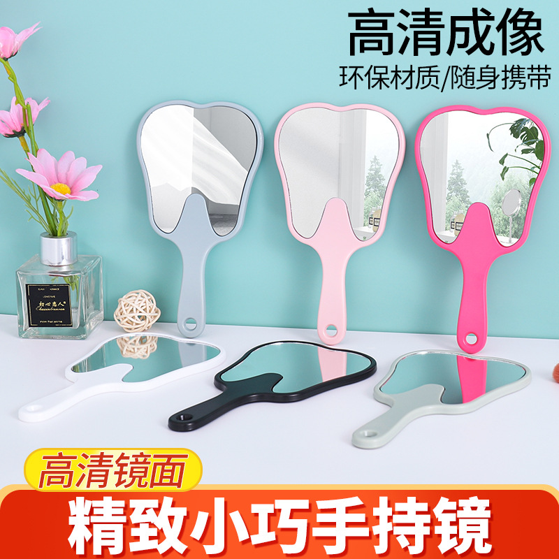 Espejo portátil en forma de diente pequeño clínico dental HD espejo de mano multicolor publicitario