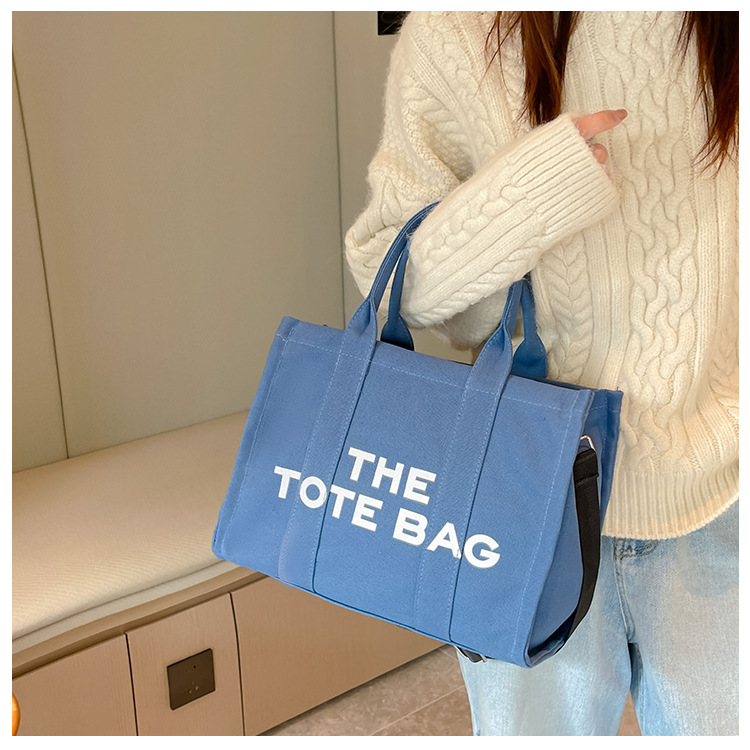 Bolso de lona Hebei Baiou para mujer, de color sólido con estampado de letras, bolso bandolera de un solo hombro con estampado de letras.