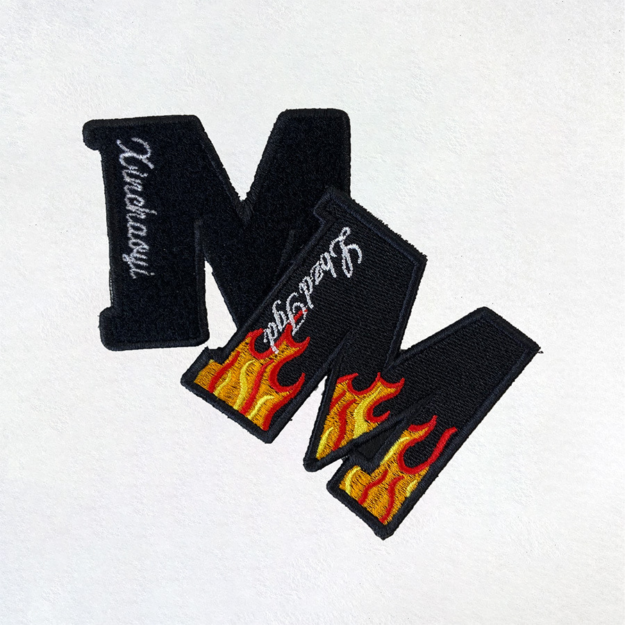 现货批发刺绣字母印花布标女装辅料织唛包贴徽章M字布贴补丁贴