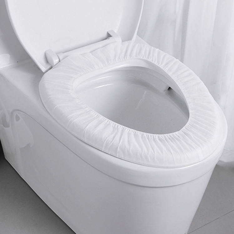 Disposable toilet seat wholesale paste travel portable maternity non-woven waterproof universal toilet seat cover toilet sticker