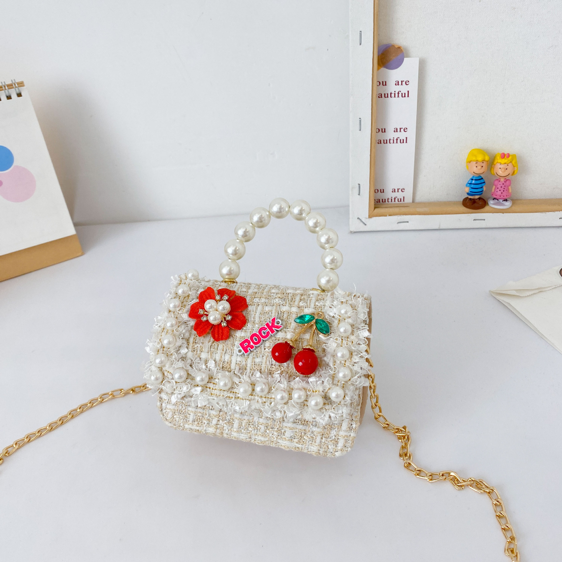 Bolso de perla para niños nuevo estilo coreano lindo estilo occidental bolsa de mensajero para niñas princesa mini cambio bolsa de accesorios