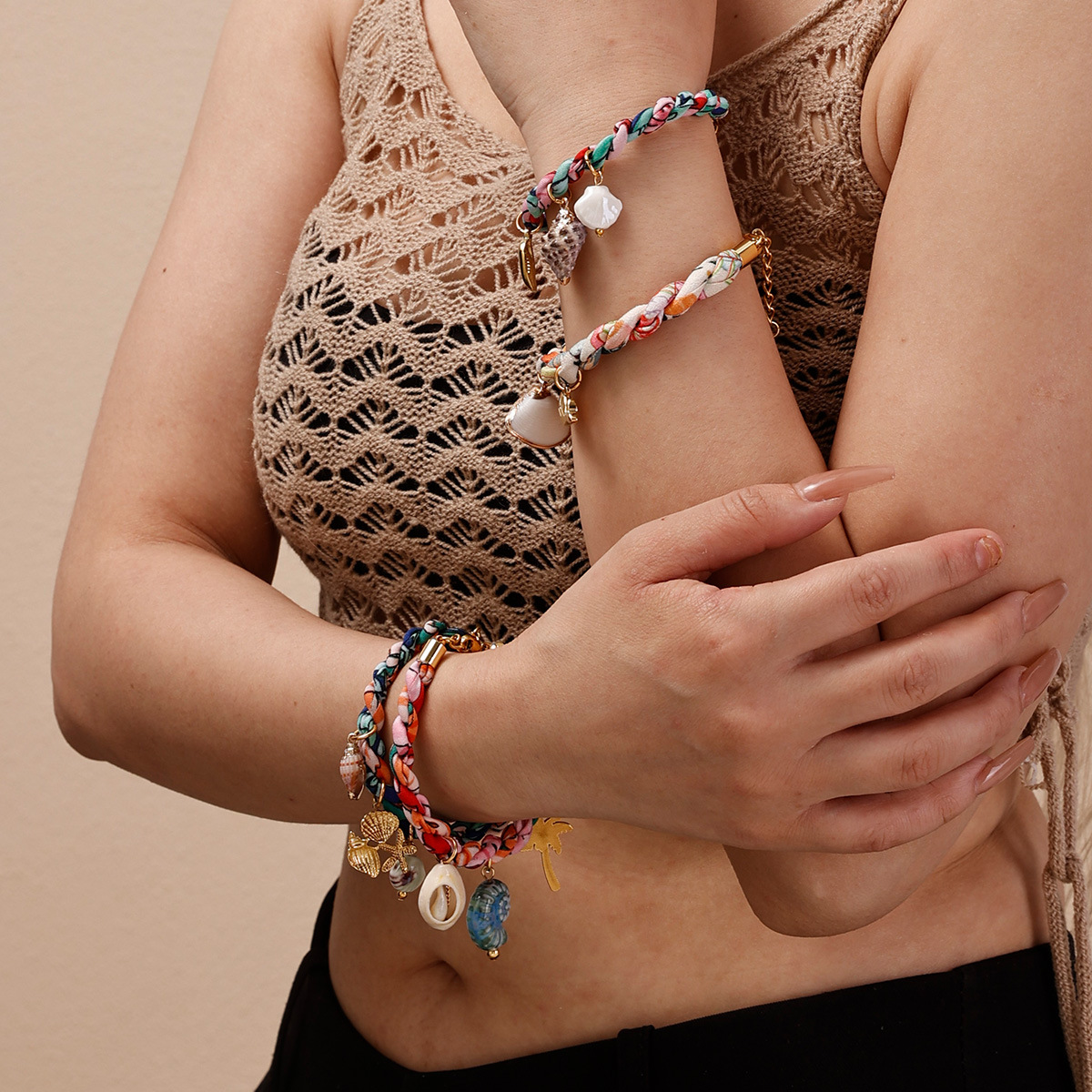 Tena Pulsera de acero inoxidable europea y americana Pulsera tejida de cuerda gruesa de alta calidad de lujo ligero Pulsera de cerámica de concha Estilo explosivo transfronterizo