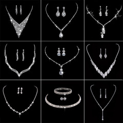 韓国の金属の爪のチェーンのダイヤモンドの結婚式のネックレスの花嫁のネックレスのイヤリングのアクセサリーの宴会のネックレスのアクセサリーのセットの卸売り