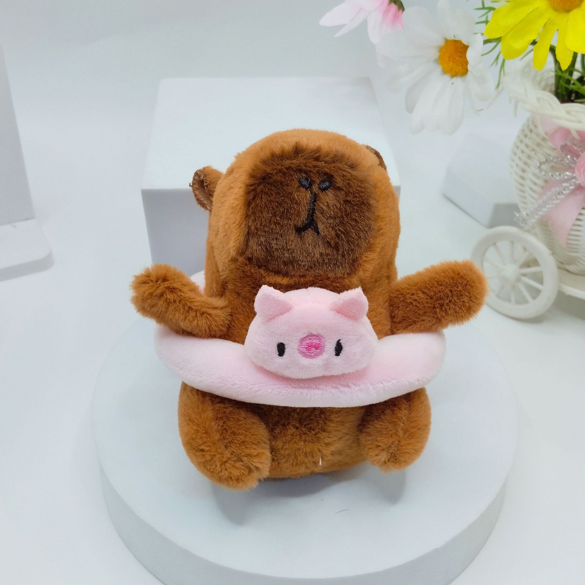Net red explosions Kapibala swimming ring plush capybara small pendant baby catching machine doll wholesale doll ornaments