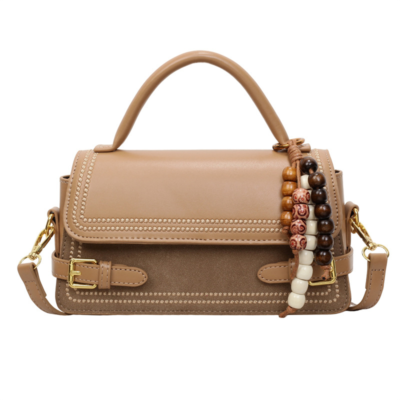 Bolso de mano popular de mujer de alto nivel de moda versátil bolso de hombro pequeño otoño y invierno 2025 nuevo tipo de mochila de viaje