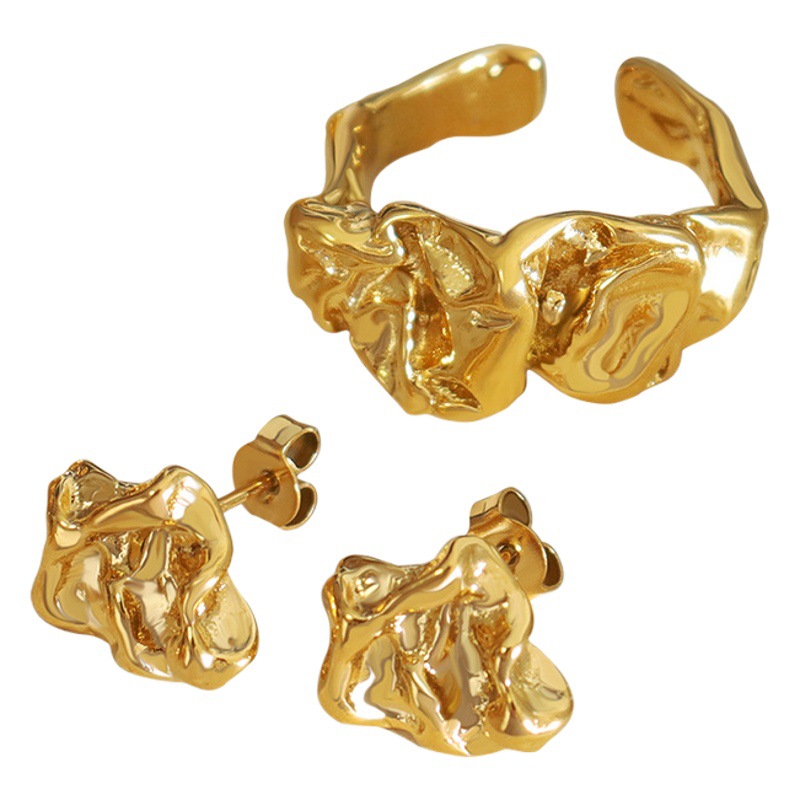 Temperamento retro de las mujeres estilo coreano personalizado diseño de nicho en relieve elegante anillo cóncavo-convexo pendientes traje de joyería