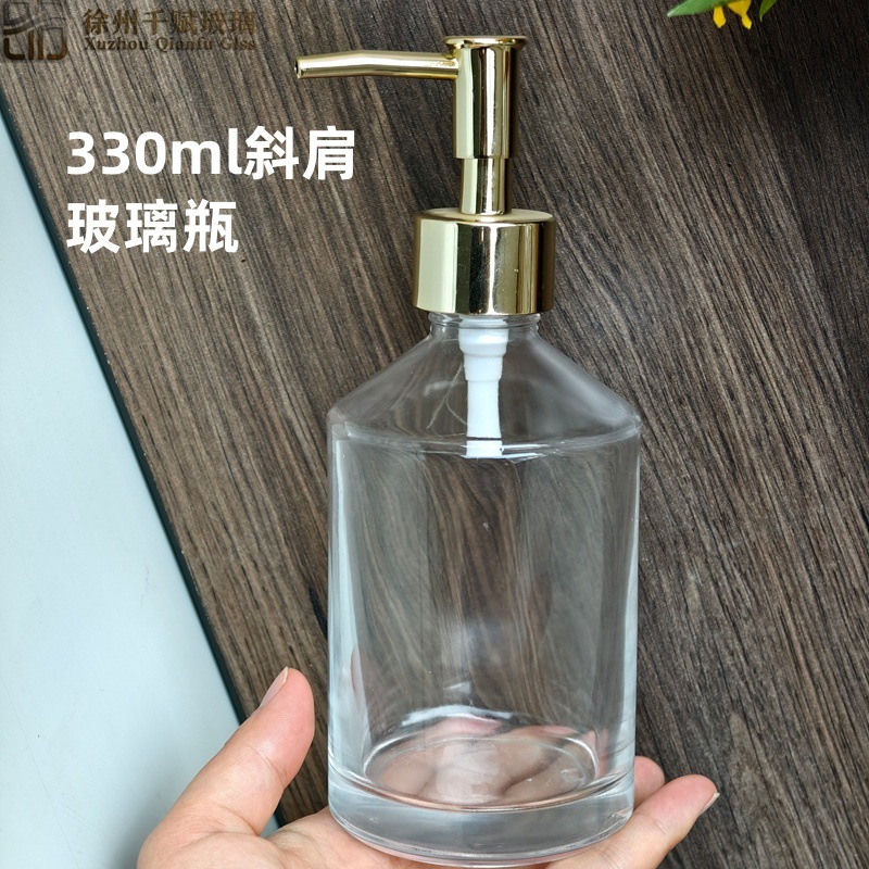 Fábrica directa 350ml botella de desinfectante de manos de cristal de hombro inclinado botella de champú de baño de presión transparente botella de champú
