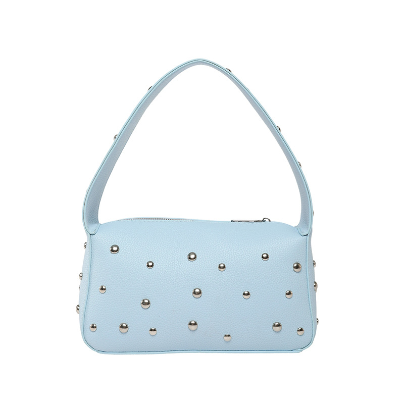 Bolso de axila con textura transfronteriza 2025 verano nuevo bolso femenino bolso de remache personalizado bolso de hombro con patrón de lichi de moda