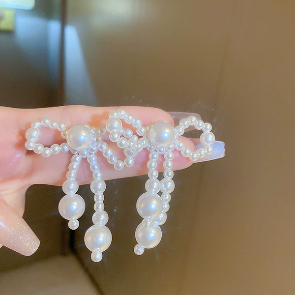 Golden white silver needle with bow from pearl