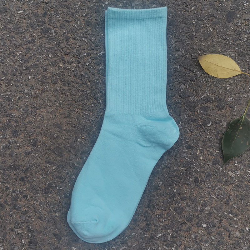 Calcetines de mujer para primavera y otoño, calcetines de algodón de color liso, versátiles y a la moda, calcetines holgados, calcetines de longitud media, calcetines deportivos que absorben el sudor, venta al por mayor.