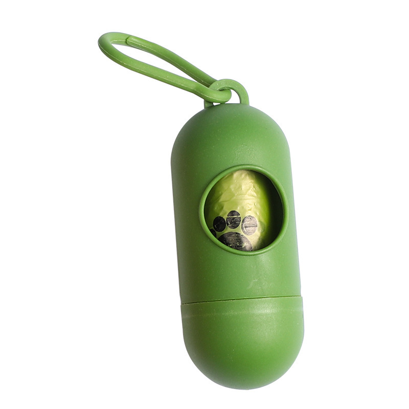 쓰레기 봉투가 있는 녹색 알약