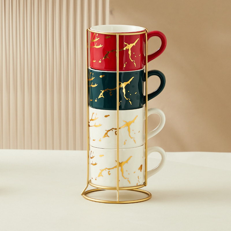 Creativo dorado Taza de cerámica taza hogar tridimensional apilada taza de cuatro piezas con marco de hierro taza de agua de café
