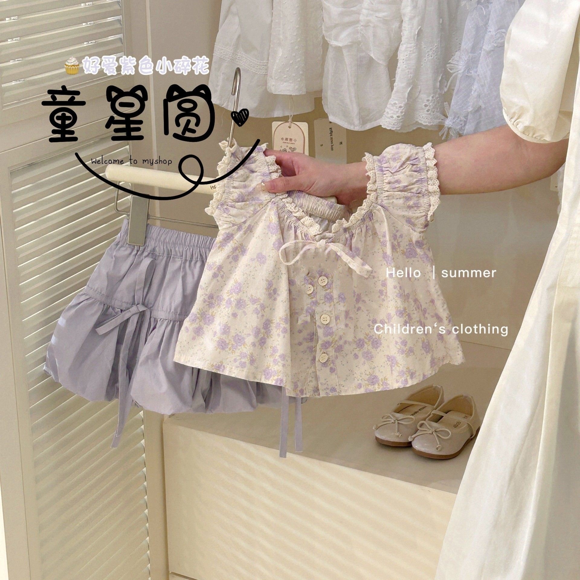 子供の星の丸い子供の服のレースの子供のシャツの新型の女の子の赤ちゃんの夏服の花の上着の洋風のショートパンツの2つのセット