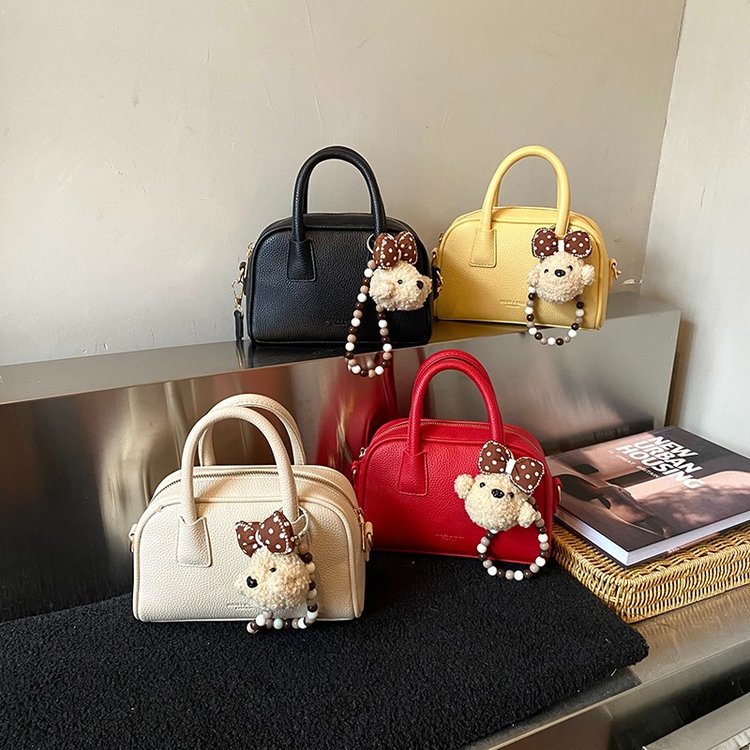 Bolsa de brazo retro nicho para mujeres 2026 nueva moda coreana bolsa de bolos portátil de gran capacidad bolso de hombro