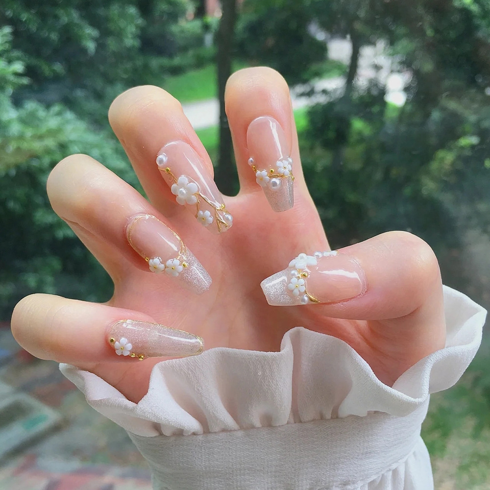24 piezas de terapia de luz de flores de cerezo de manicura de perlas de diamante de alto rendimiento parche de uñas falsas hechas a mano para usar uñas de ojo de gato